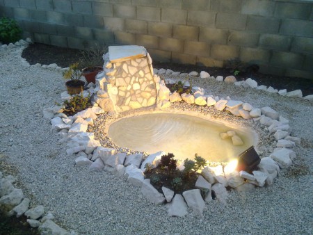 laghetto artificiale realizzato con pietre reciclate